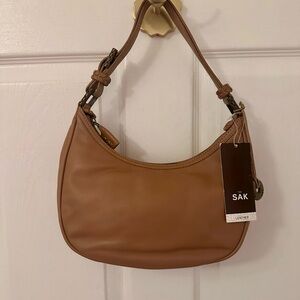The Sak Leather Crescent Shoulder Bag in Cognac